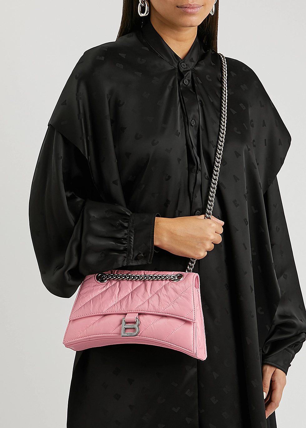 Embrace Elegance and Innovation: A Detailed Exploration of the Balenciaga Crush Medium Chain Bag, Quilted in Pink