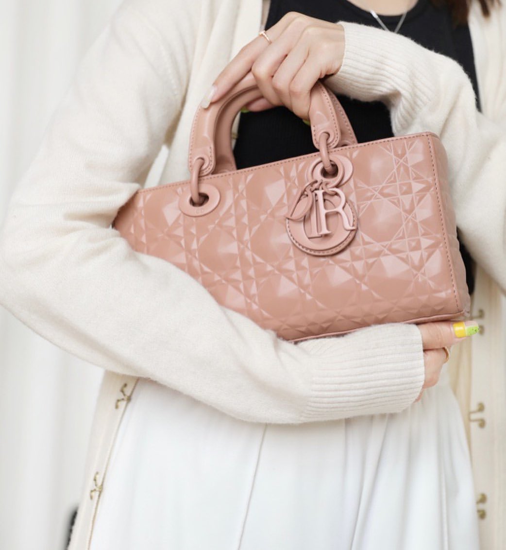 Elegance Personified: A Detailed Examination of the Lady D-Joy Bag Rose Des Vents Cannage Calfskin with Diamond Motif