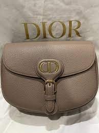 The Medium Dior Bobby Bag in Warm Taupe-Grained Calfskin: A Masterpiece of Luxury and Elegance The Medium Dior Bobby Bag in Warm Taupe-Grained Calfskin: A Masterpiece of Luxury and Elegance